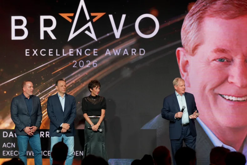 Dave Merriman of ACN receiving the Bravo Excellence Award at the DSN Global 100 Celebration