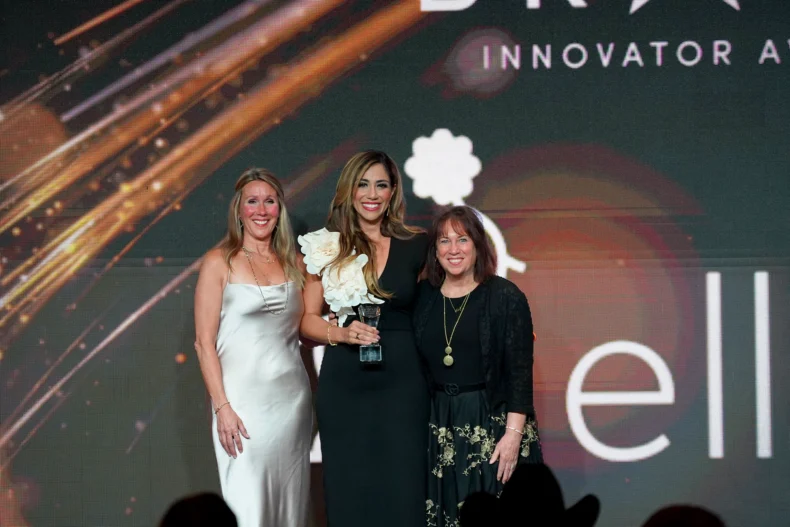 Ellie MD team receiving the Bravo Innovator Award at the DSN Global 100 Celebration