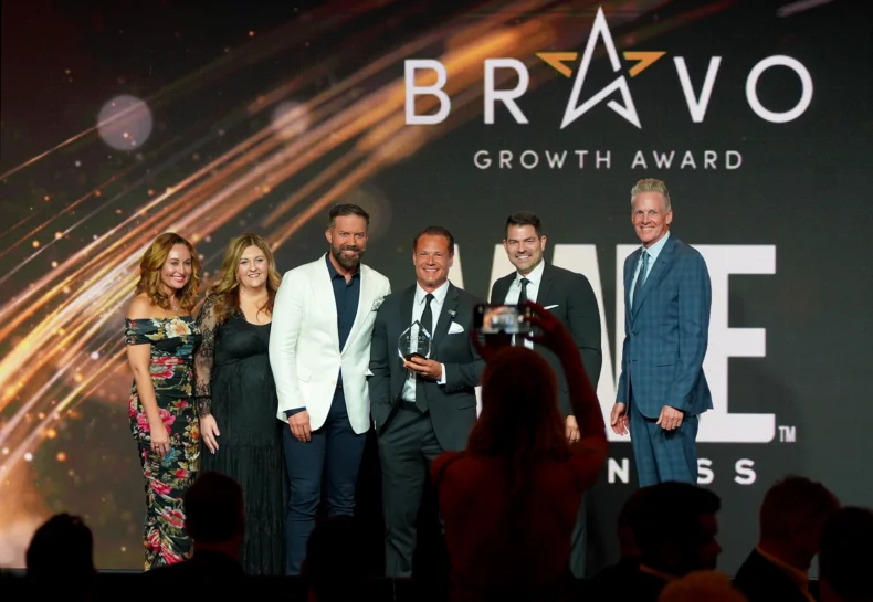 MAKE Wellness team receiving the Bravo Growth Award at the DSN Global 100 Celebration