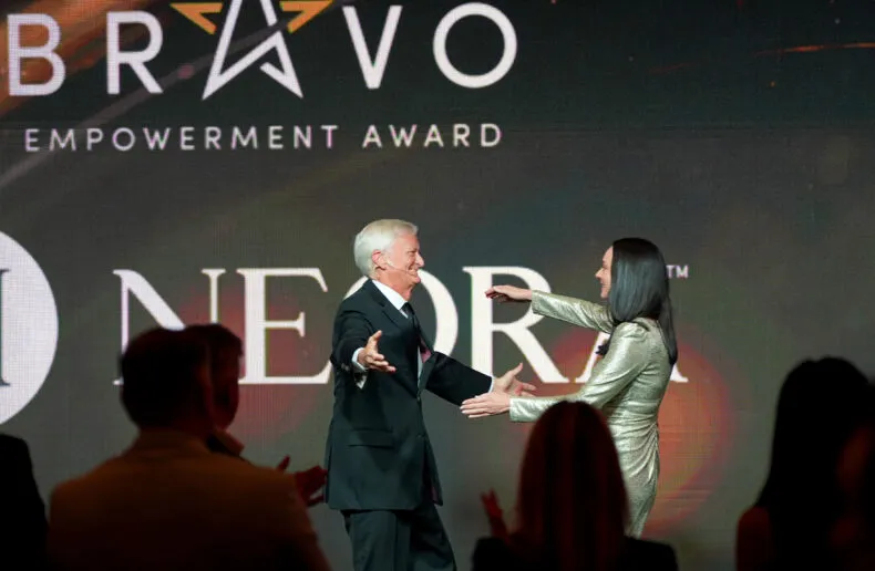 Neora receiving the Bravo Empowerment Award at the DSN Global 100 Celebration
