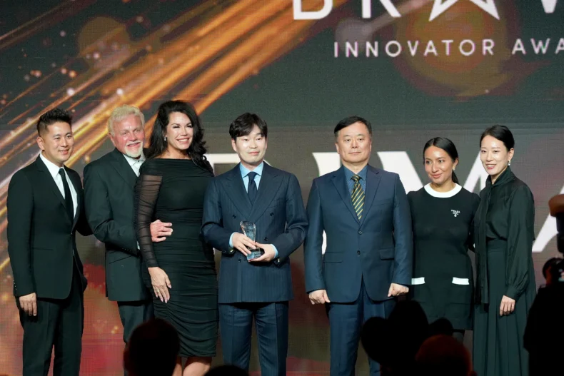 RIMAN team receiving the Bravo Innovator Award at the DSN Global 100 Celebration