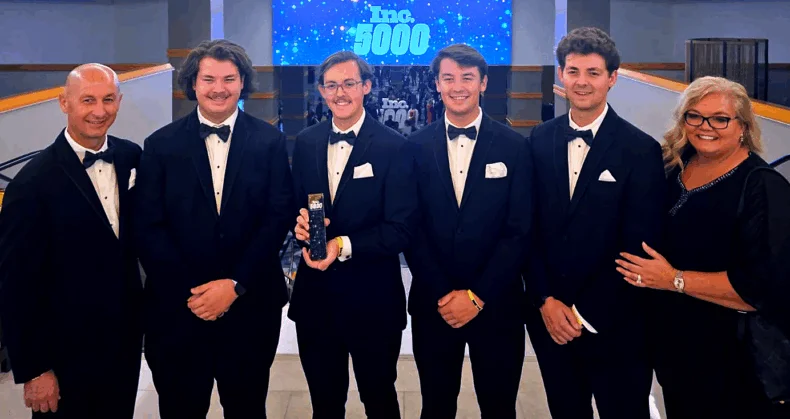 At Inc. 5000 Gala: The Emry family with Bravenly's Award