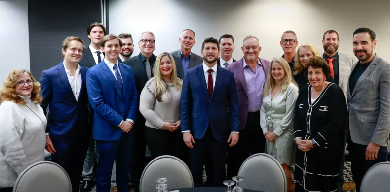 Group photo of direct selling leaders and Ryan Chamberlin at Florida industry meeting
