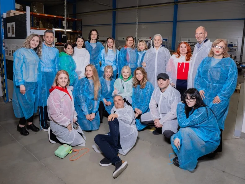 Greenway Global M Pro leaders touring perfume factory production area