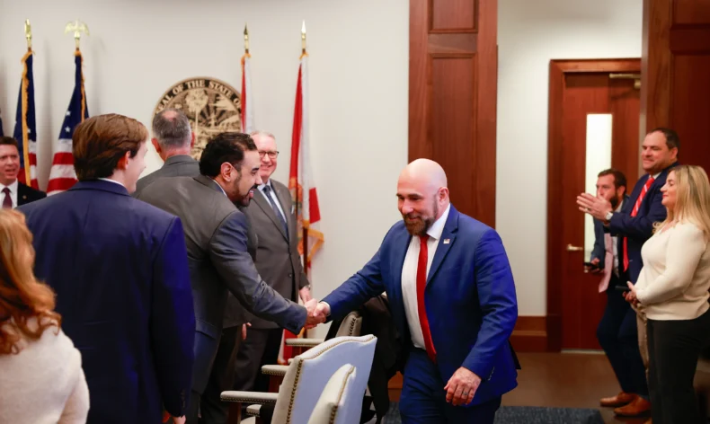 Florida Lieutenant Governor Jay Collins with Ray Urdaneta of Monat and Parker Emry of Bravenly and the group at FLDSCC event