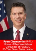 Rep. Ryan Chamberlin, Florida House of Representatives, 30-year direct sales veteran standing in front of an American flag