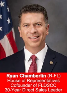 Rep. Ryan Chamberlin, Florida House of Representatives, 30-year direct sales veteran standing in front of an American flag