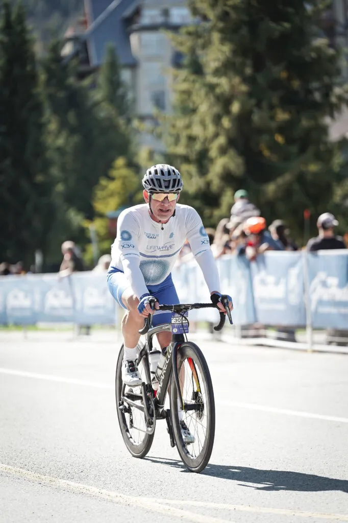 David Miller cycling in LifeWave and THIS IS IT Team apparel