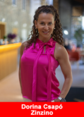 Dorina Csapó, Zinzino Crown Leader and former fitness champion, smiling in a bright pink top