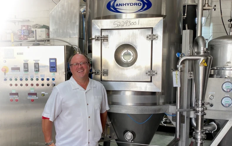 Dr. Anthony Kleinsmith, founder of Anovité, standing inside a colostrum processing and formulation facility