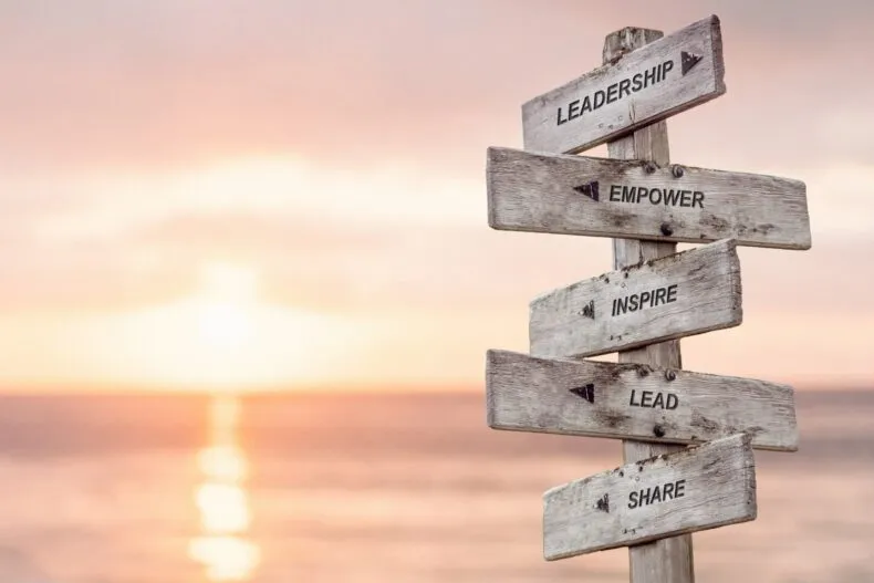 Leadership signpost representing vision, empowerment, inspiration, and direction in personal growth and business leadership