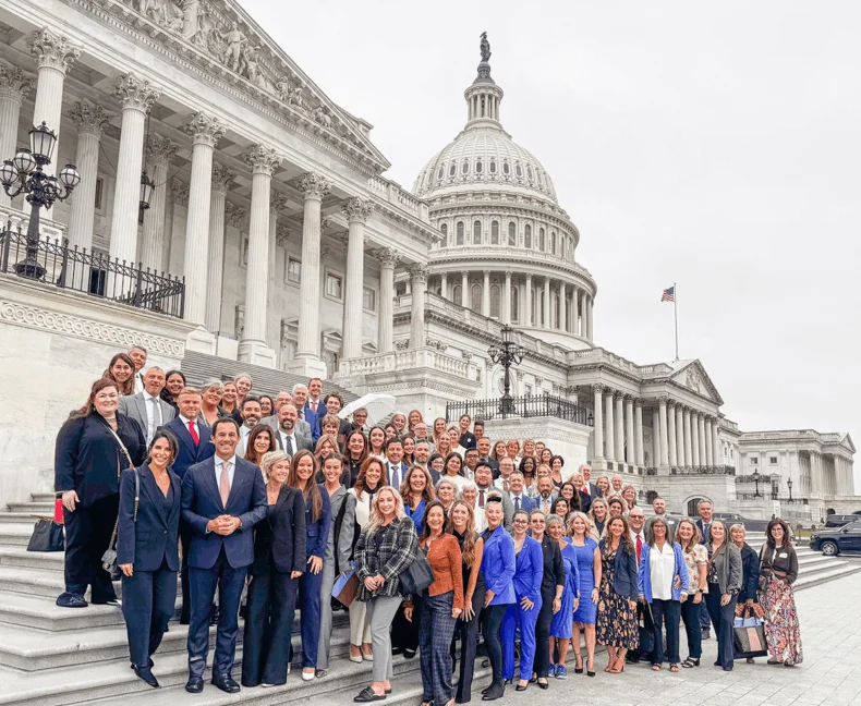 Group of DSA members and direct sellers gather on the steps of the U.S. Capitol during Direct Selling Day 2025