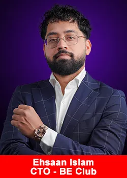 Ehsaan Islam, CTO of BE Club, standing confidently in a dark suit with arms folded