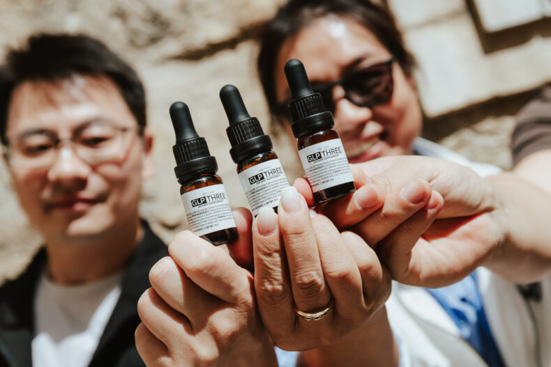 GLP THREE metabolic health product bottles