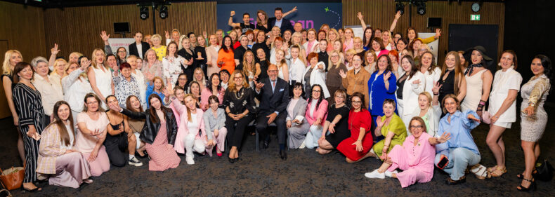 Large group photo of Greenway partners and leaders posing at a European Tour event.