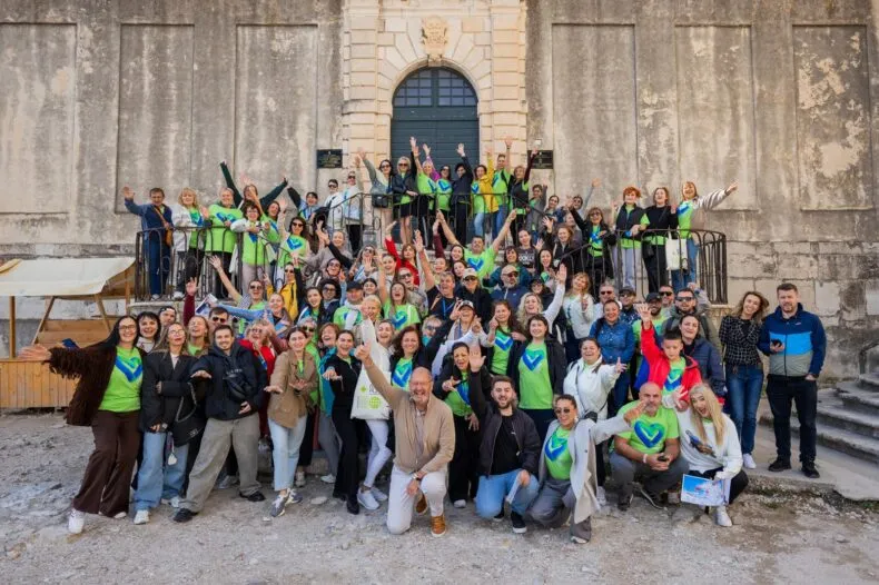 Greenway Global partners and leaders from around the world gather on the steps in Croatia for the Leaders Camp, celebrating unity, collaboration, and growth.