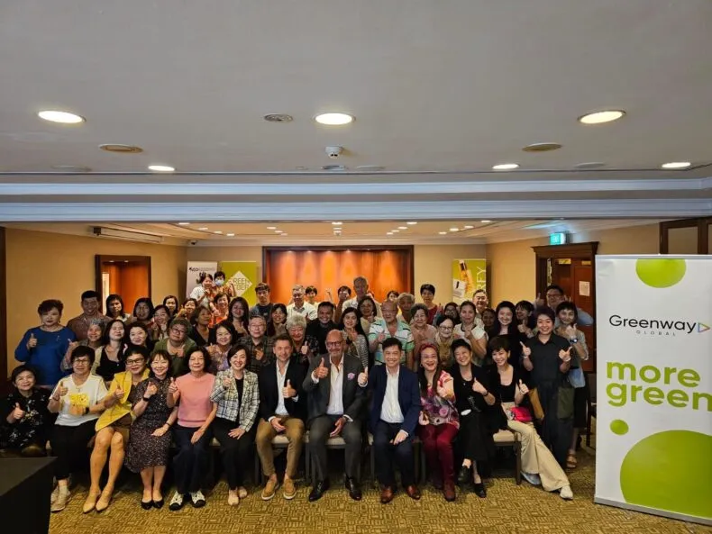 Large group photo of Greenway Global attendees at the Singapore kickoff event for the 2025 Asian Tour.