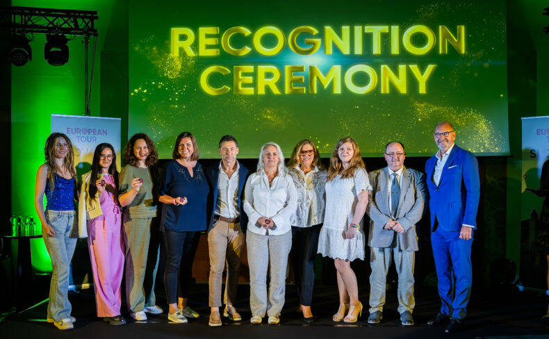 Group of Greenway Global leaders standing on stage under a screen that reads “Recognition Ceremony.”