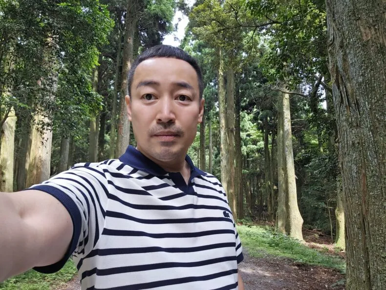 Heo Je-won in a forest during his MWR Life travel journey