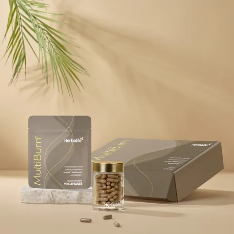 Herbalife MultiBurn product display with capsules, jar, pouch, and box on a beige background with a palm leaf shadow.