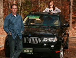Joni and Chad Robbins with the Free BMW