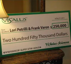 Lora Petrilli and Frank Varon Bonus Check