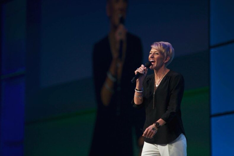 Jessica Ellerman, Director of Sales and Marketing at Anovité, speaking on stage