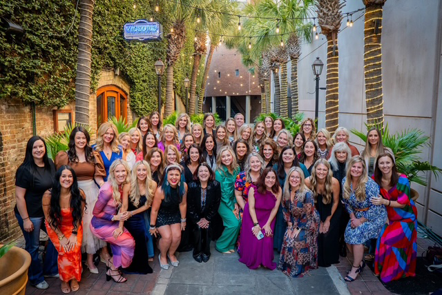 Laura Bangar with members of her Bravenly Global organization