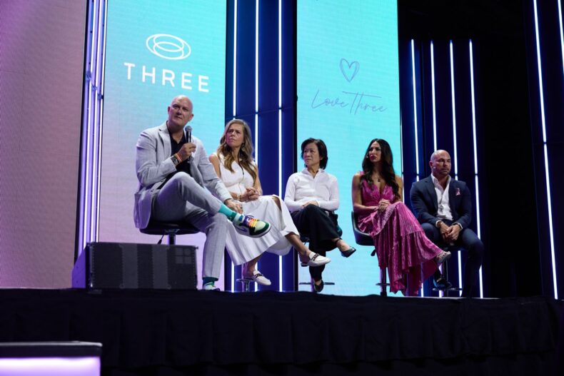 THREE International leaders on stage during a Love Three panel discussion at the company’s convention
