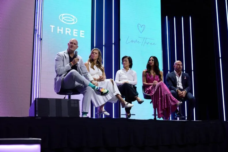 THREE International leaders on stage during a Love Three panel discussion at the company’s convention