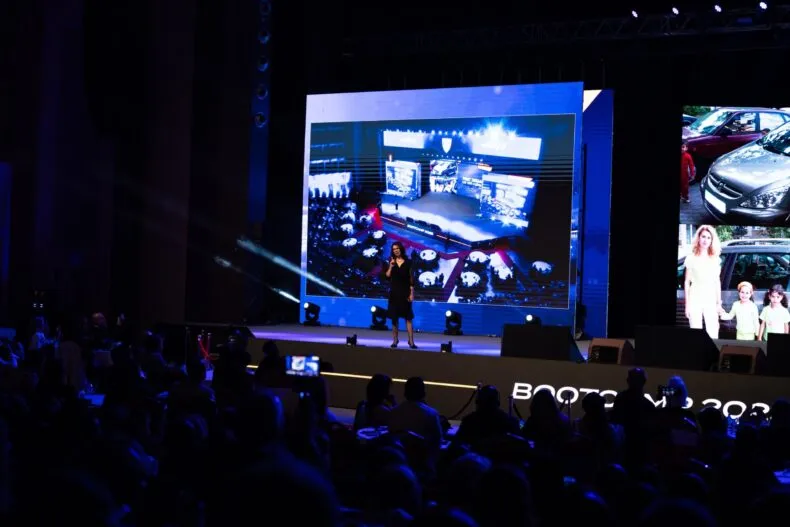 Luminita Mirescu addressing a global audience at an MWR Life leadership event