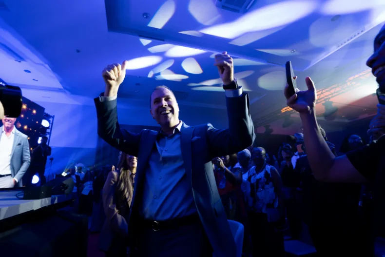 MWR Life Leadership Bootcamp attendee celebrating during an international company event