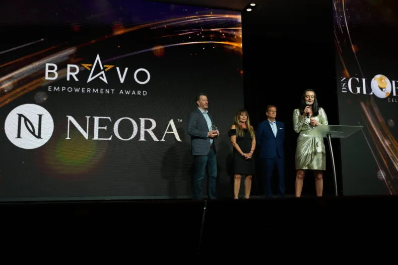Neora Bravo Empowerment Award Direct Selling News stage presentation