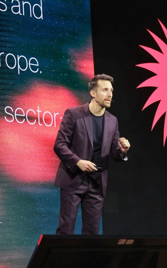 Large audience attending a network marketing leadership event