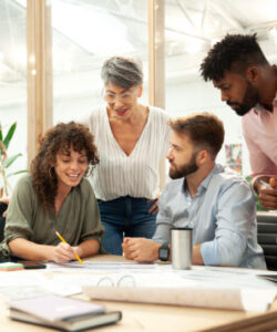 Team collaborating and planning business strategy together