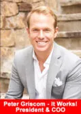 Peter Griscom smiling in a light gray suit, seated on outdoor stone steps, newly appointed President and COO of ItWorks.