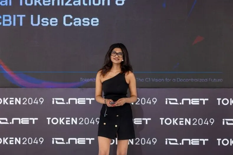 Regina Rao from C1 presenting CBIT and tokenization strategy at TOKEN2049 Dubai