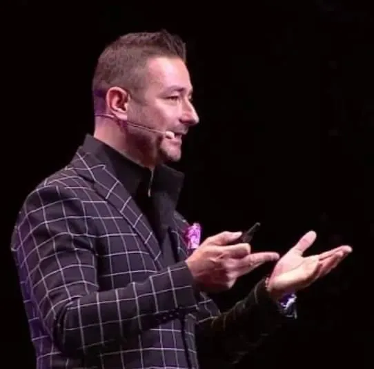Roland Kegye speaking at network marketing event
