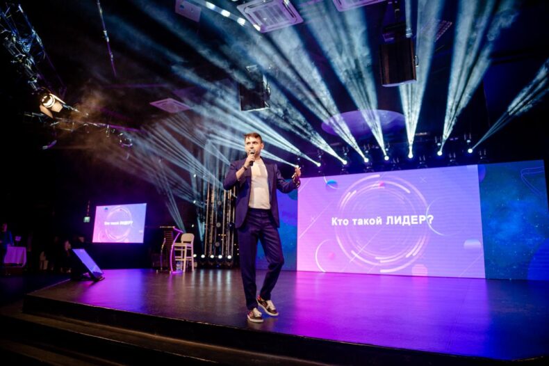 Roman Mishuk speaking at network marketing event