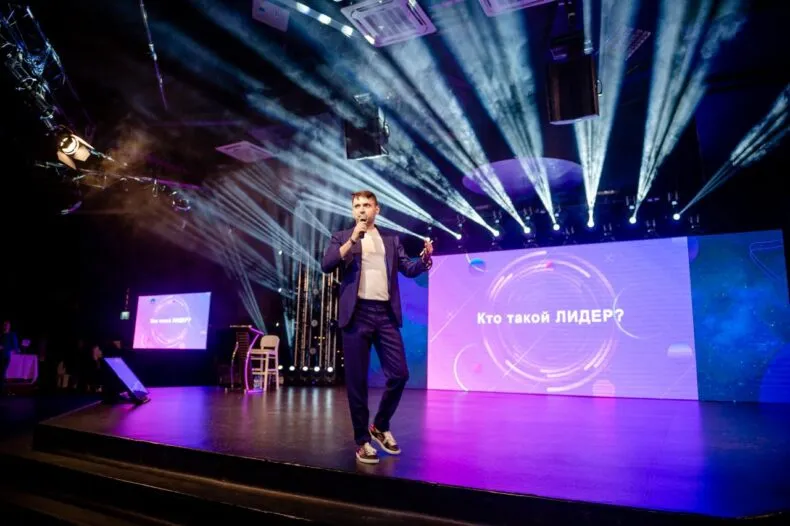 Roman Mishuk speaking at network marketing event