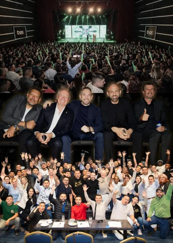 The Code XTERA Bogotá event leadership team and audience