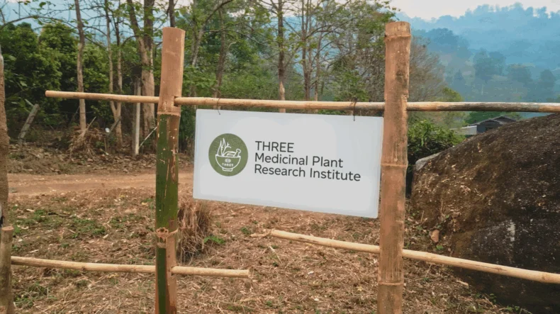 Sign for the THREE Medicinal Plant Research Institute in Thailand