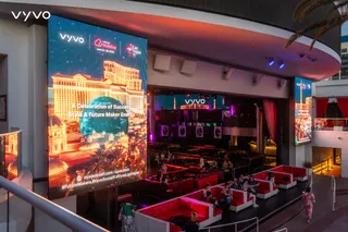 Vyvo-branded event venue at night with large screens and ambient lighting in Las Vegas.