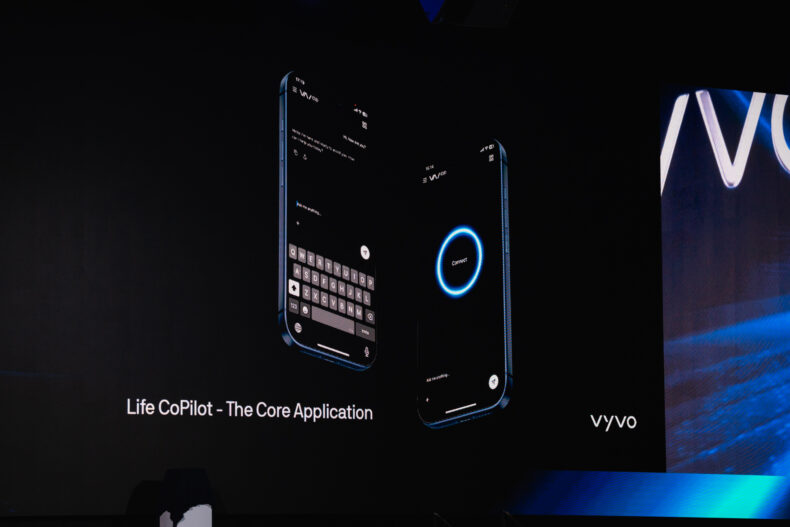 Life CoPilot mobile app interface displayed on a large screen during the Vyvo International Convention 2025