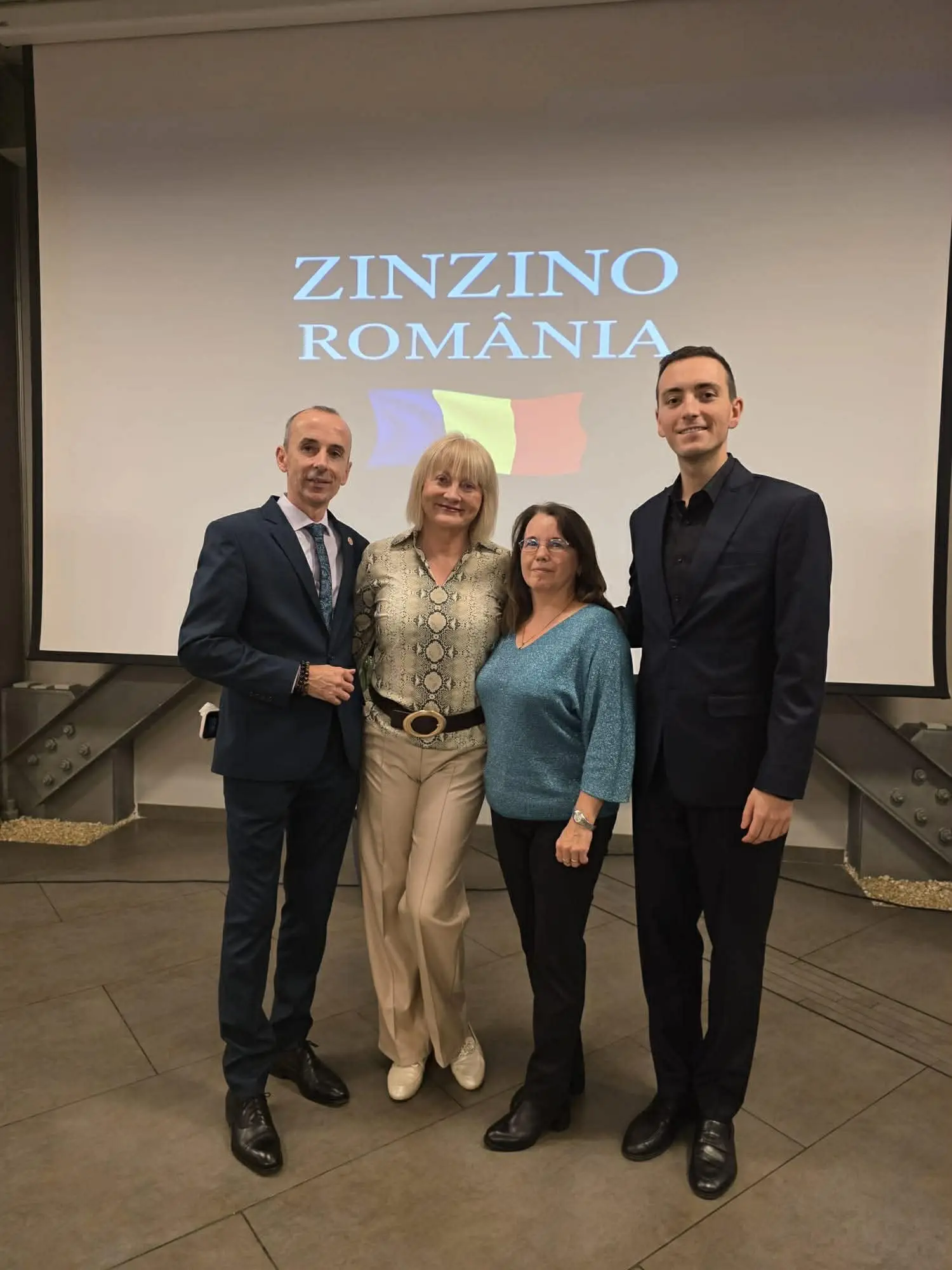 Zinzino Romania leadership team pictured at a business event with Levente Okos